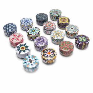 Custom 2.2 oz belly shaped candle tin collection with printed designs