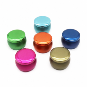 Custom 4.4 oz belly shaped candle tins in assorted metallic colors