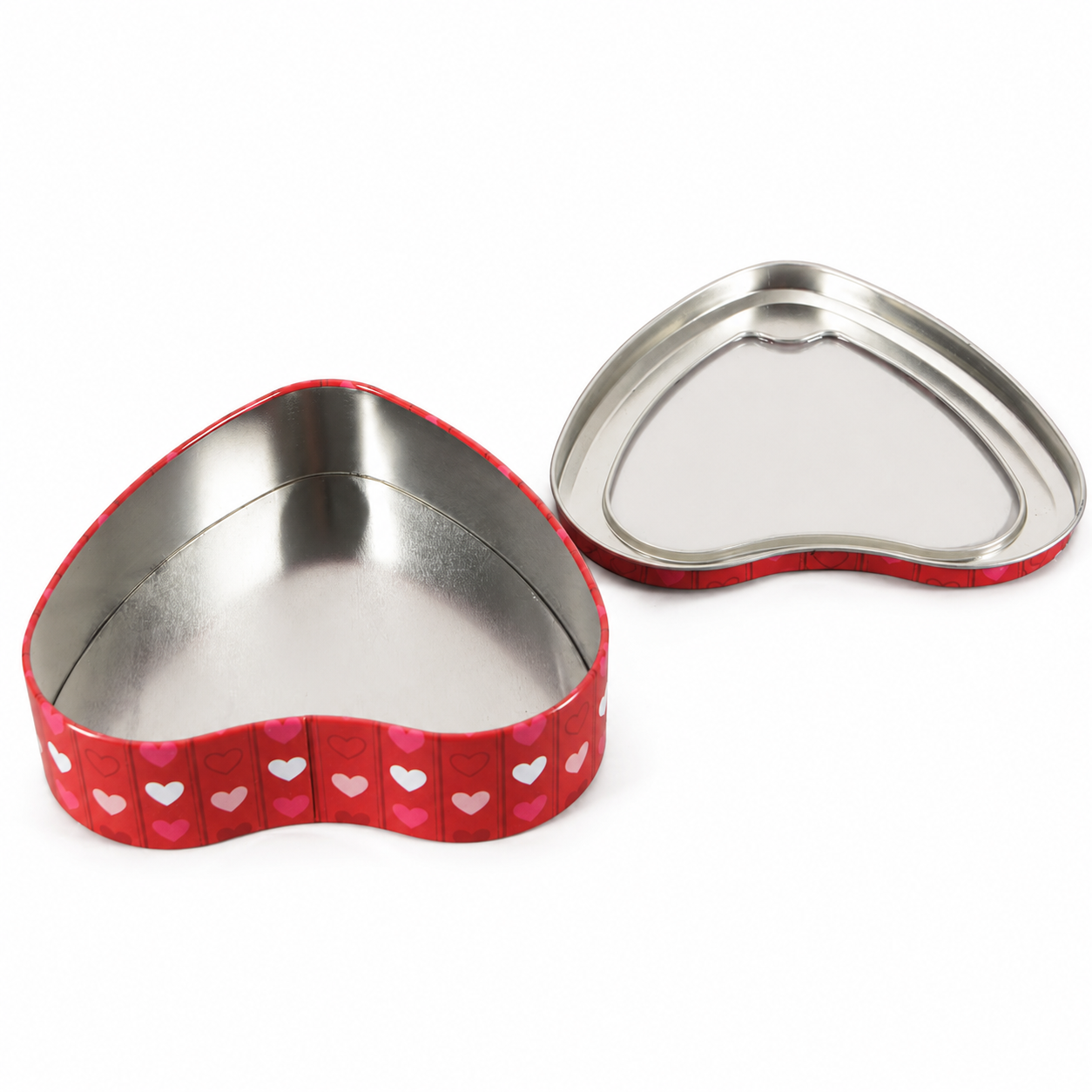 Heart shaped tin box showing the lid and interior structure