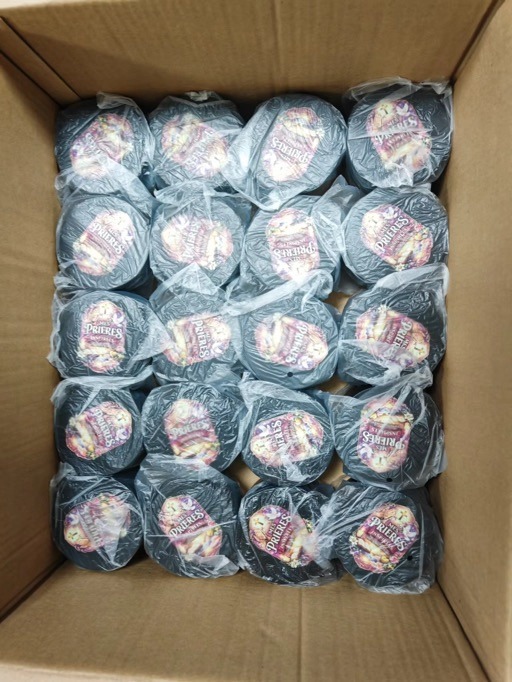 Tin boxes packed in individual bags inside an export carton