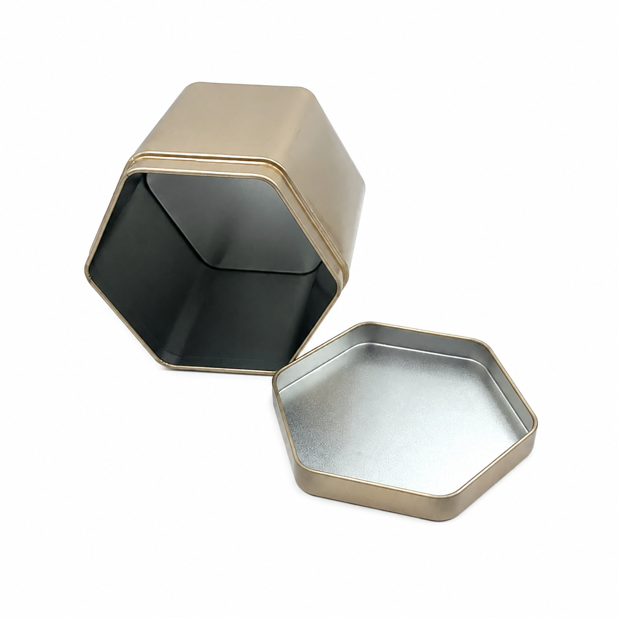 Open custom hexagonal tea tin box showing the interior and removable lid