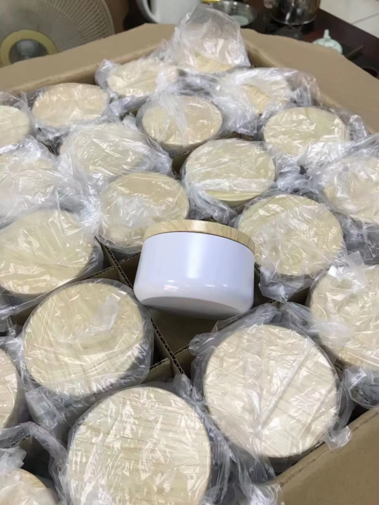 Round tin containers packed in individual protective bags